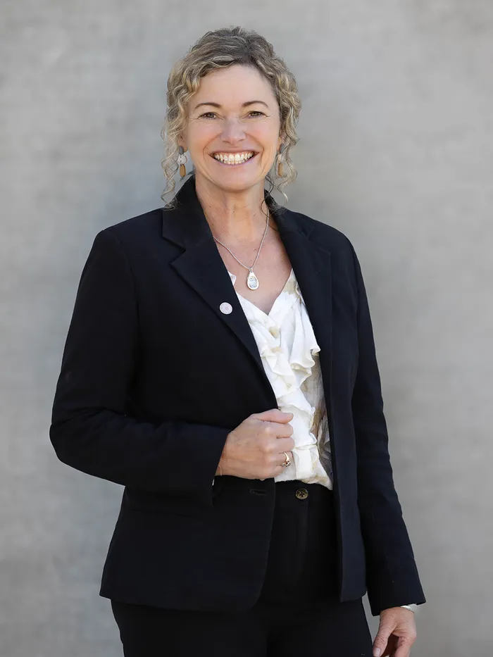 Business headshot against a concrete wall, Eye Photography business portfolio