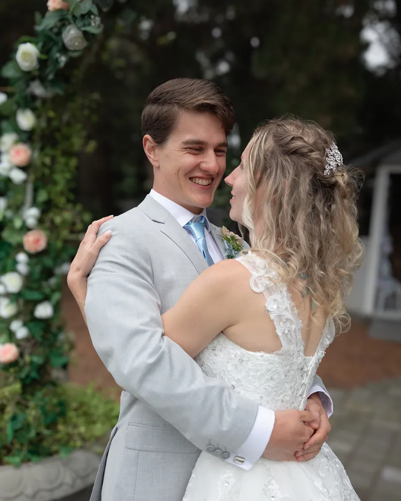 Bride and groom embracing at their wedding, Eye Photography wedding portfolio